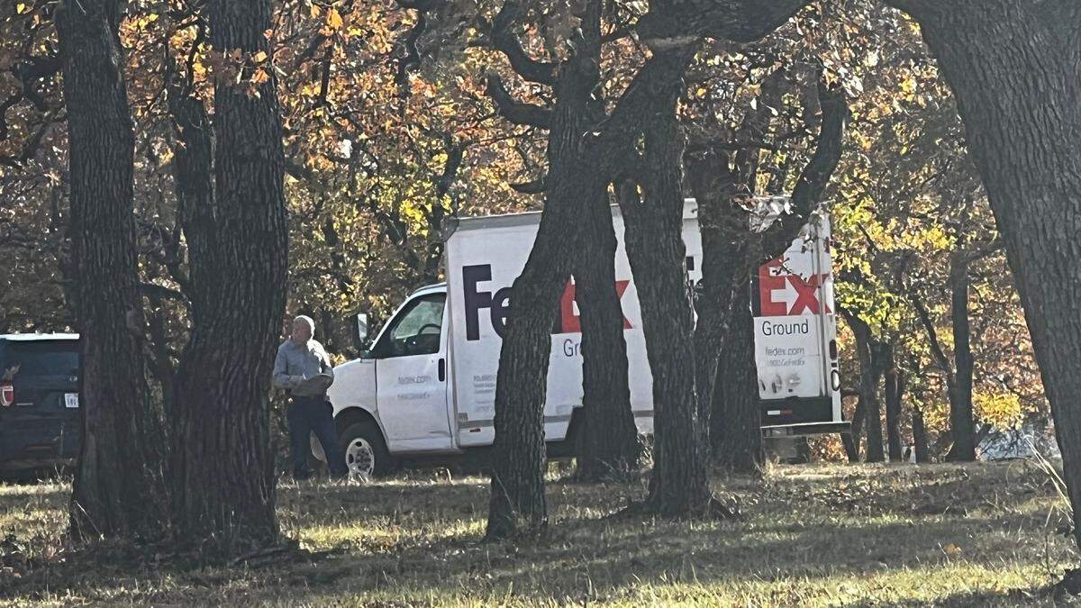 Investigators were seen surrounding a parked FedEx truck on Faith Trail in Wise County around 3:20 p.m. on Friday, hours before they announced they had found Athena Strand’s body.