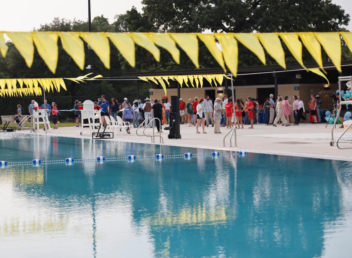 People mingled around before the grand re-opening of Forest Park Pool in Fort Worth, Texas, Friday May 24, 2024. (Special to the Star-Telegram/Bob Booth)
