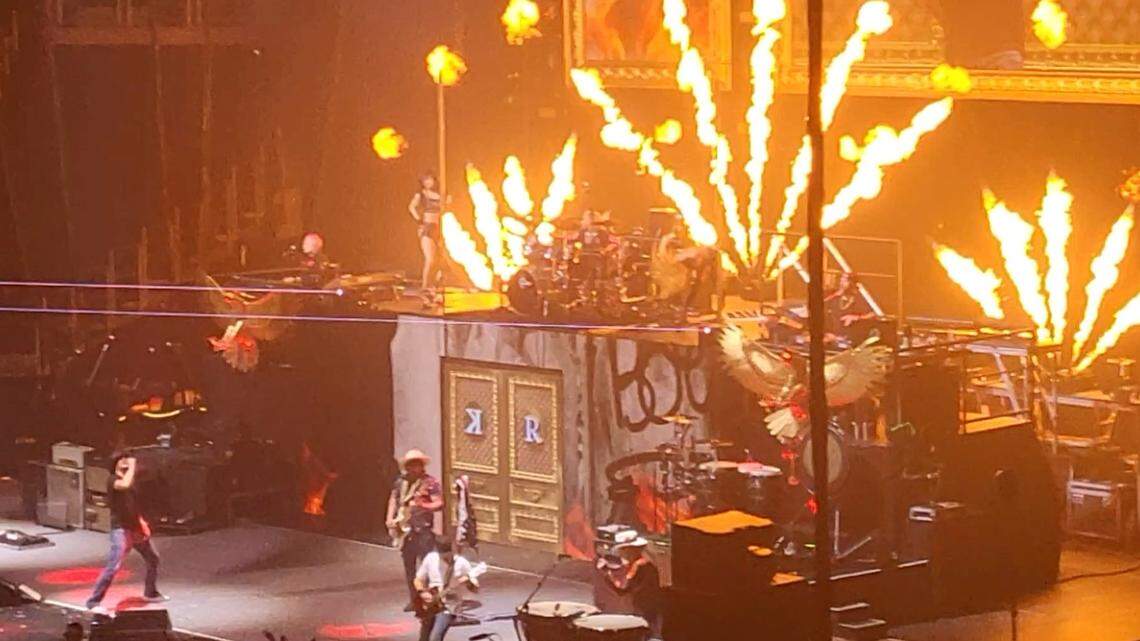 Kid Rock, left, and his eight-piece band, plus two pole dancers, performed in front of about 11,000 fans Saturday night at Dickies Arena. The 17-song set was accentuated with pyrotechnics, lasers, and confetti.