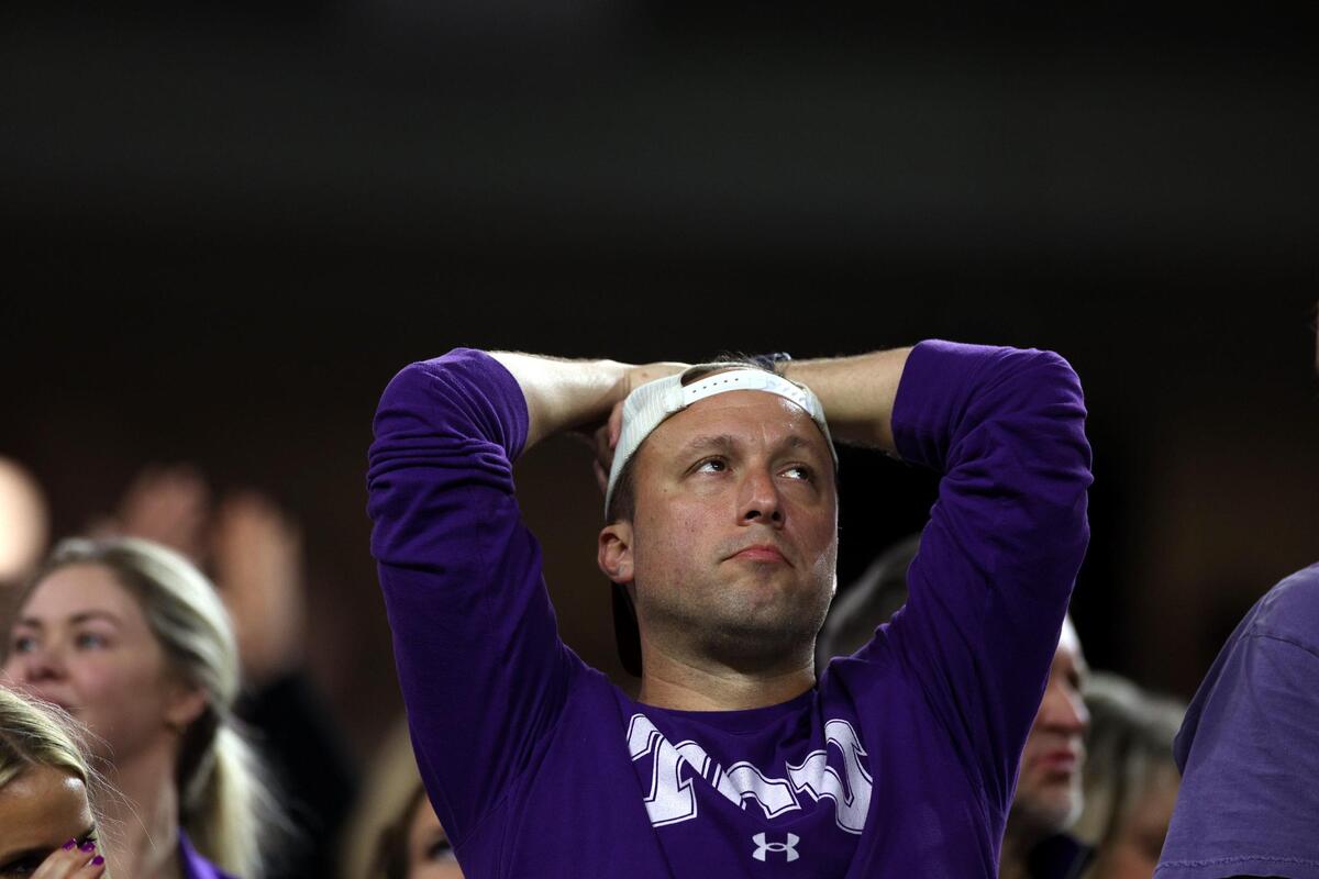 A TCU fan reacts to uninterrupted touchdowns by Georgia during the College Football Playoff National Championship on Monday, Jan. 9, 2023, at SoFi Stadium in Inglewood, Calif.