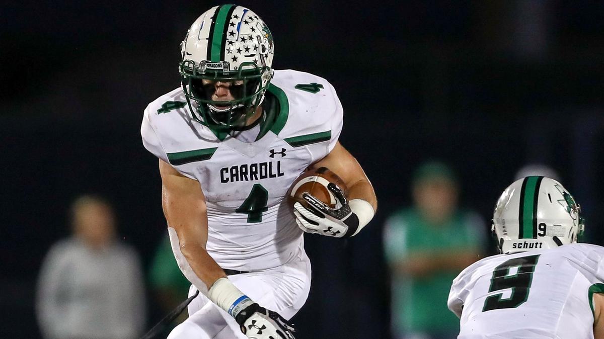 Soutlake Carroll running back TJ McDaniel (4) leaps in the air against Keller during the first half, September 28, 2018 at Keller ISD Stadium in Keller.