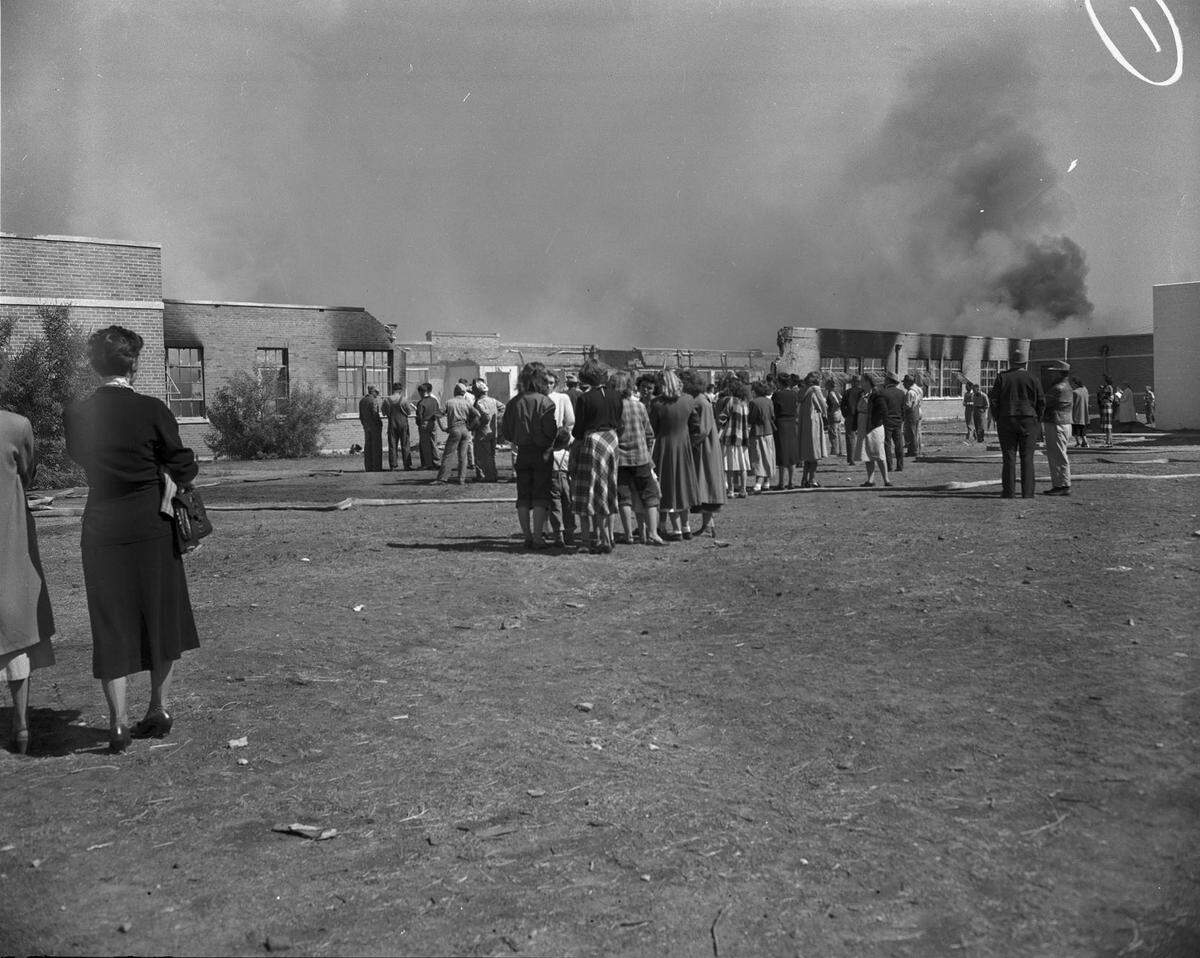 Oct. 18, 1948: Students and townspeople watching the fire at Keller school.