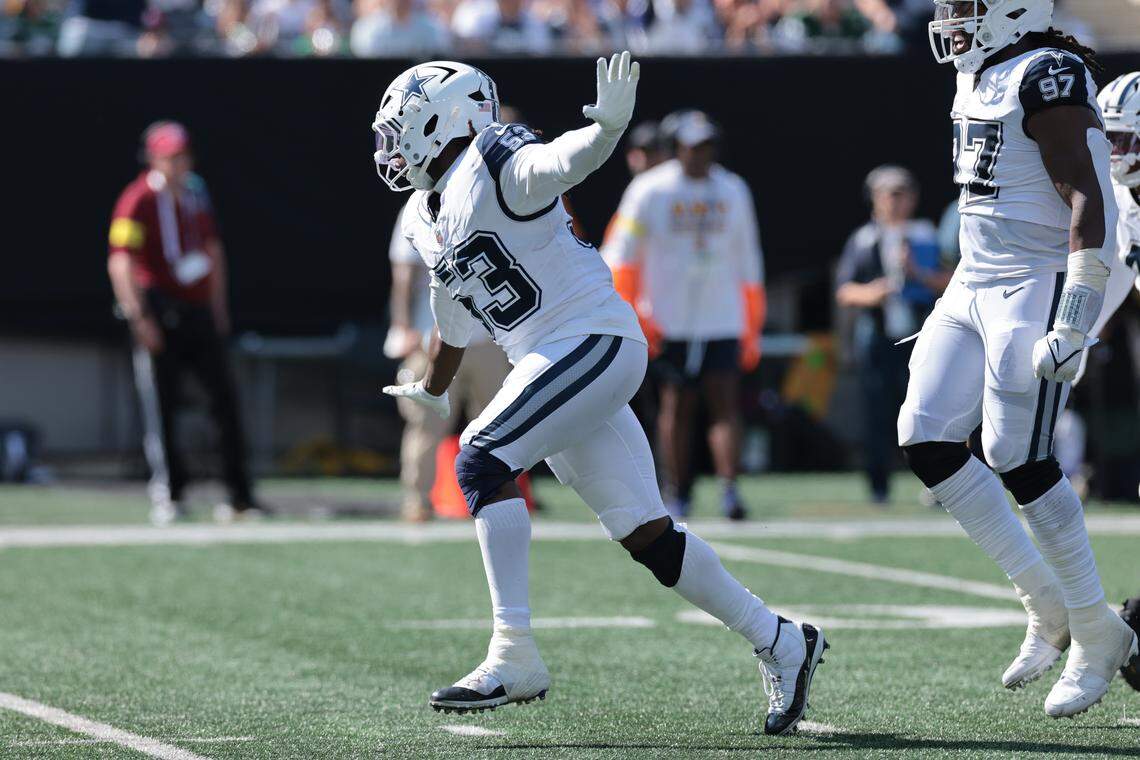 Dallas Cowboys defensive end James Houston (53) reacts after a sack against the New York Jets during the first half Sunday at MetLife Stadium in East Rutherford, N.J.