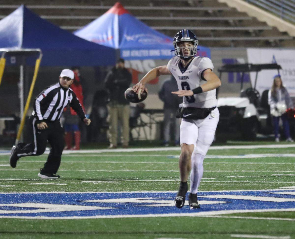 Liberty Christian quarterback Quinn Murphy looks to pass at Waco ISD Stadium in Waco, Texas, on Saturday, Dec. 7, 2024.