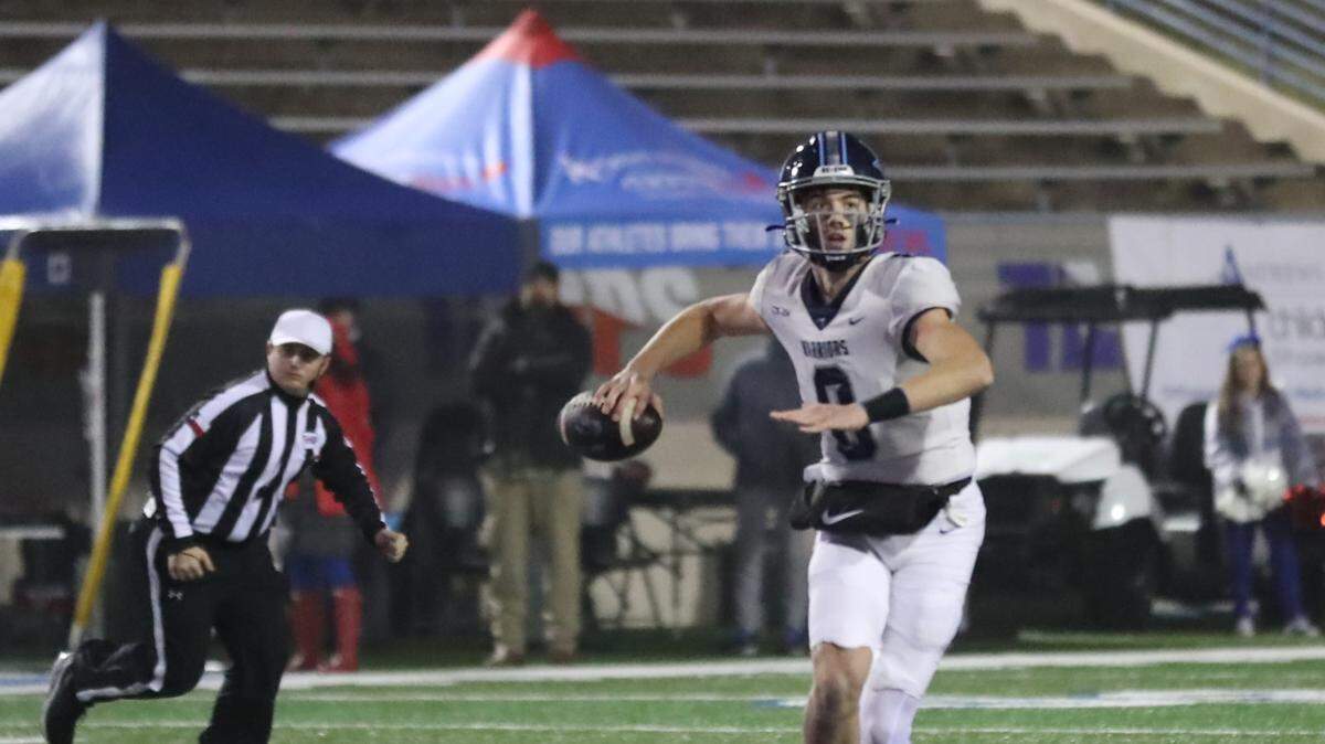 Liberty Christian quarterback Quinn Murphy looks to pass at Waco ISD Stadium in Waco, Texas, on Saturday, Dec. 7, 2024.