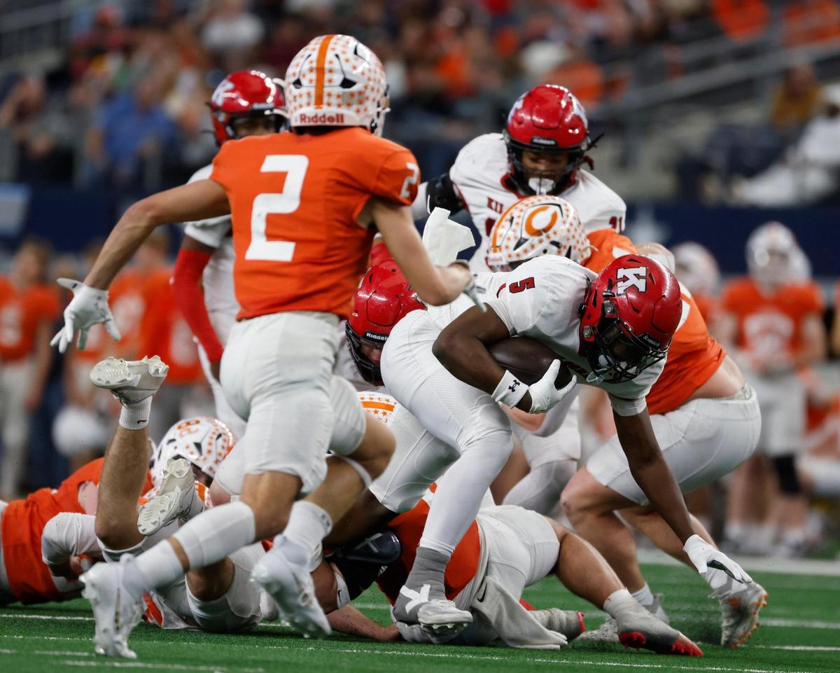 Kilgore running back Isaiah Watters (5) steps through the pile against Celina during the UIL 4A D1 State Championship football game at AT&T Stadium in Arlington, Texas, Friday, Dec. 20, 2024.