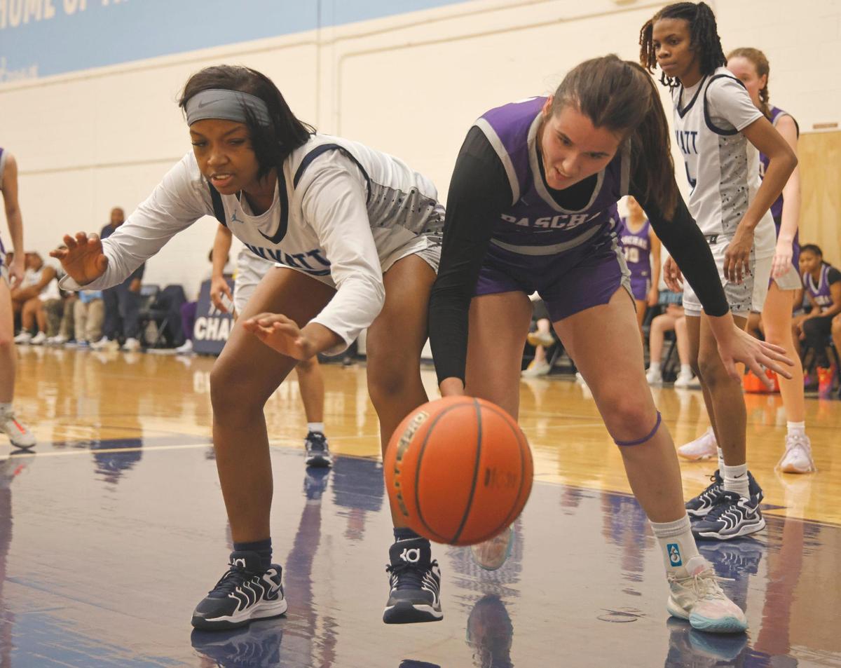 O.D. Wyatt guard Delaney Griggs (15) and Paschal forward Amelia Robbins (21) chase a loose ball out of bounds during a UIL girls basketball game at O.D. Wyatt High School in Fort Worth, Texas, Friday, Jan. 24, 2025.
