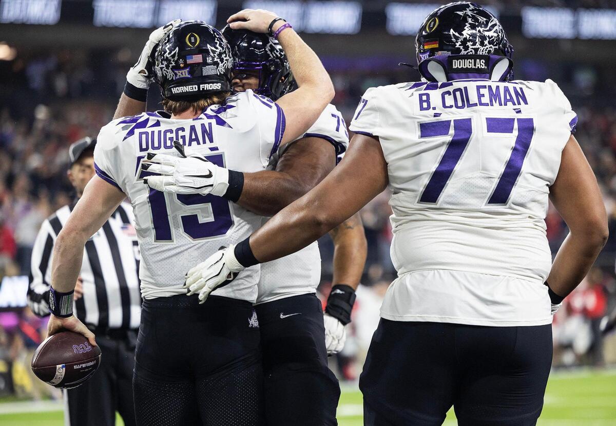 TCU quarterback Max Duggan, left, celebrates with teammates after running in a touchdown at the 2023 College Football Playoff National Championship on Monday, January 9, 2023, at SoFi Stadium in Inglewood, Calif.