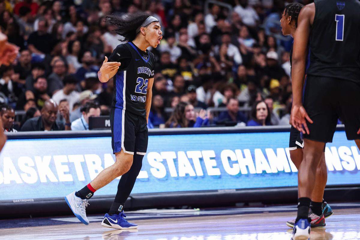 North Crowley guard Isaak Hayes (22) screams in celebration after making a three pointer in the Class 6A Division I state championship against San Antonio Brennan at The Alamodome in San Antonio, Texas, March 14, 2026.