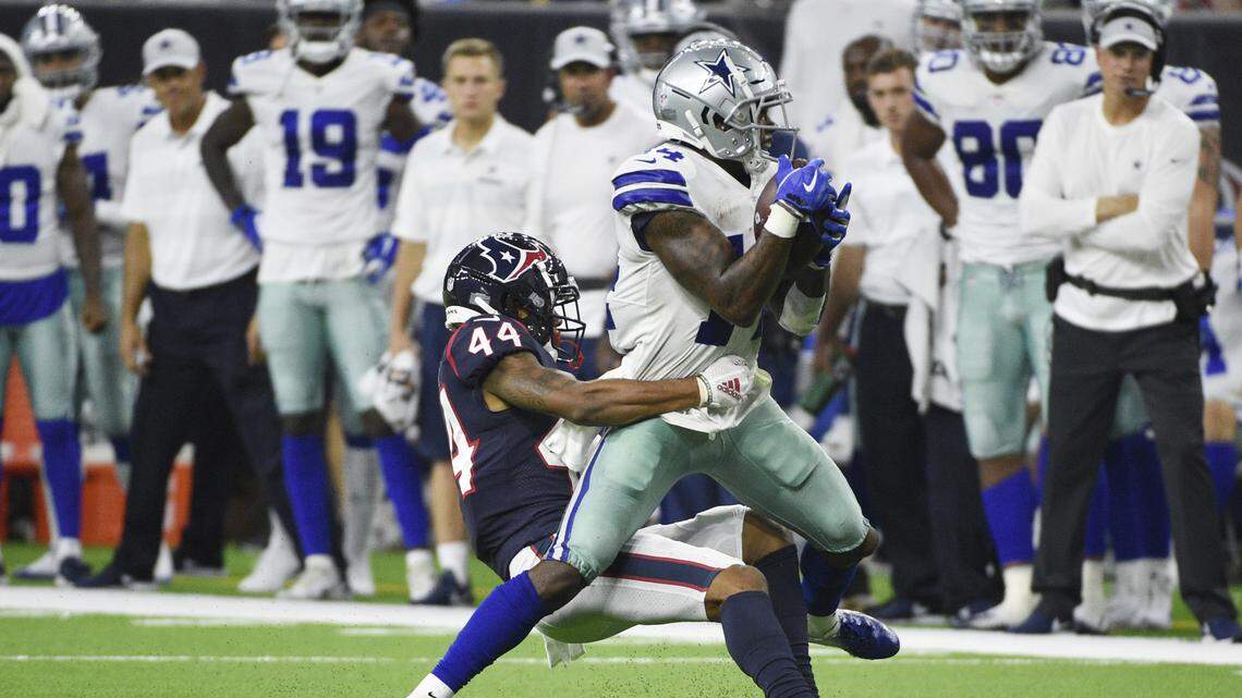 Dallas Cowboys receiver Lance Lenoir is hit by Houston Texans defensive back Bryce Jones as he makes a catch during the second half of Thursday’s 14-6 loss at NRG Stadium. Lenoir led the Cowboys with nine receptions.