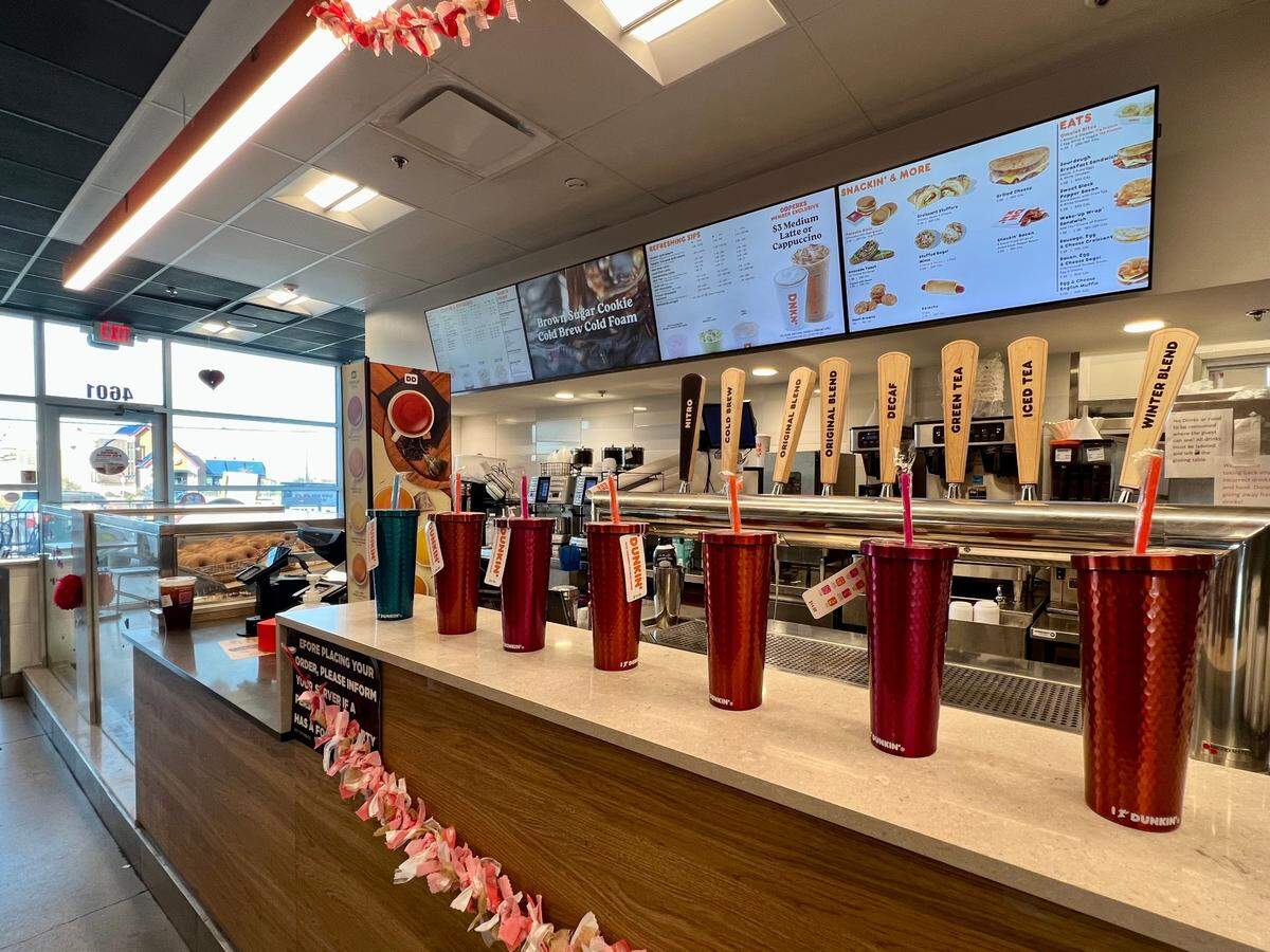 A modern Dunkin’ restaurant features coffee instead of doughnuts.