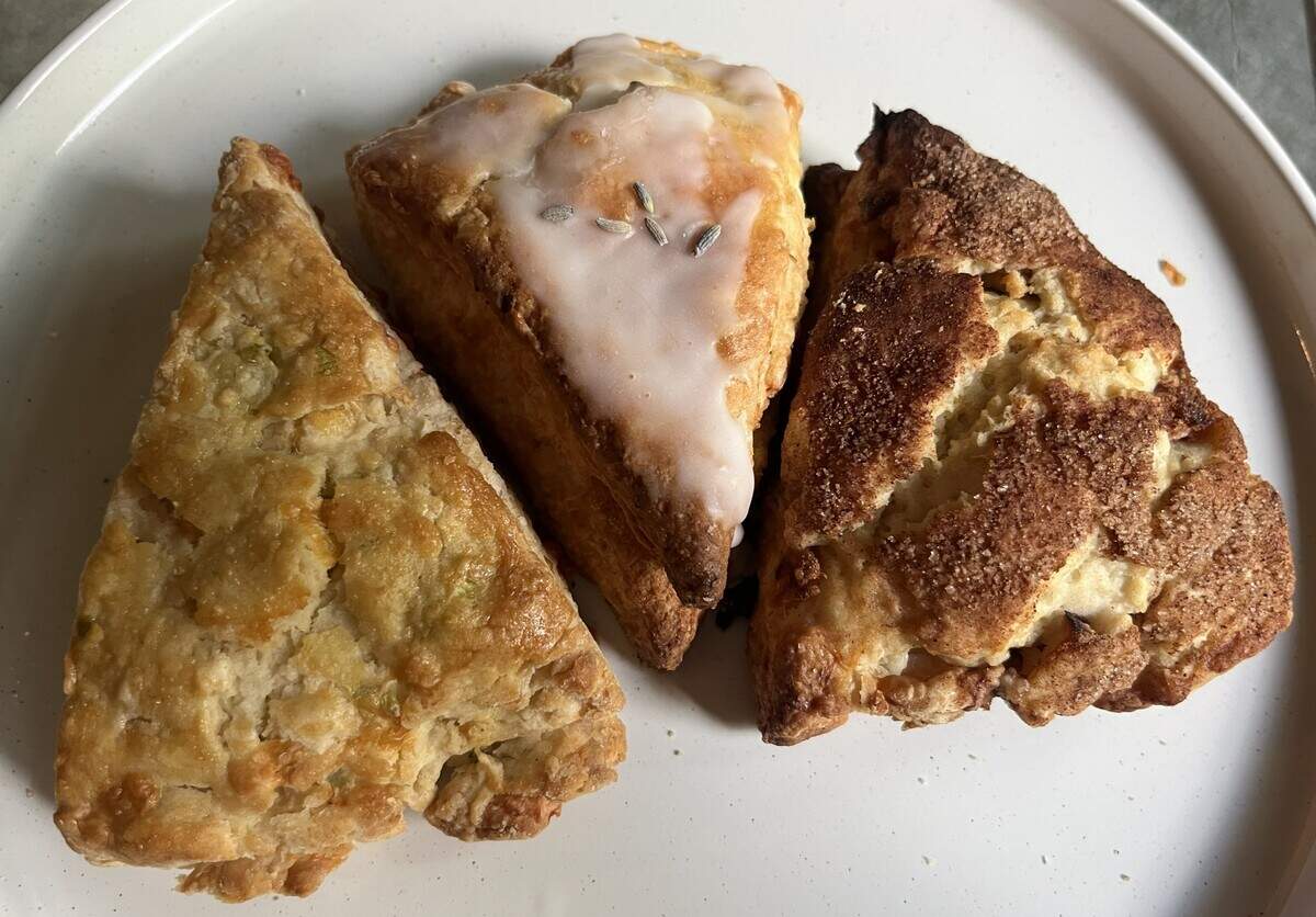 From left to right: the cheddar scallion, lavender lemon and peach cobbler scones from Sunrise Scones in South Main Village, Fort Worth.