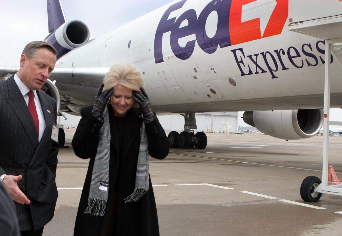 H. Ross Perot Jr. and U.S. Secretary of Transportation Mary E. Peters tour the local Fedex facility near Alliance Airport on Friday, February 2, 2007 in Fort Worth, TX. Peters traveled to Fort Worth to see how the growing demand for air cargo is leading to job growth and new development at Alliance Airport.(Special to the Fort Worth Star-Telegram/Emily Hughes)