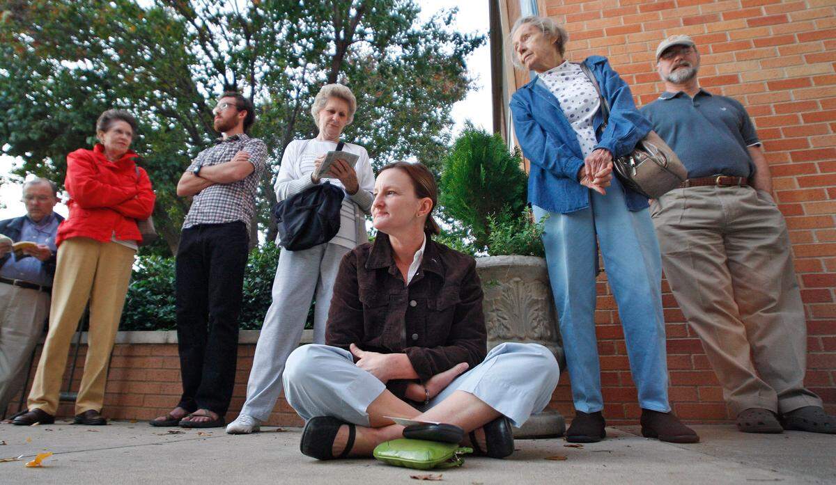 Nov. 4, 2008: At 6:30 a.m., there was a line down the steps of Tanglewood Elementary School in Fort Worth. Janet Brammer, seated, waited with other voters for the 7 a.m. opening. In the background are: Sue Wernet, Dabiel Leverdnz, Jo Belew, Jesse Reinburg and J.J. Appelfeller.