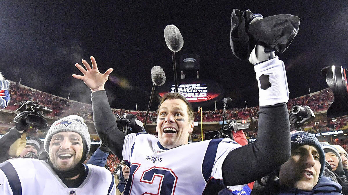 New England Patriots quarterback Tom Brady celebrates after the game-winning touchdown in overtime for a 37-31 win against the Kansas City Chiefs during the AFC Championship game on Sunday, Jan. 20, 2019 at Arrowhead Stadium in Kansas City, Mo. (John Sleezer/Kansas City Star/TNS)