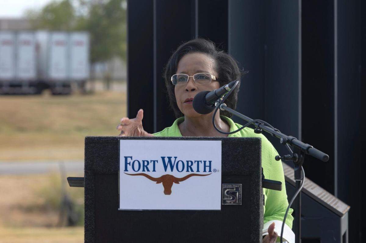 Mayor pro tem Gyna Bivens welcomes people to a celebration of Reby Cary in Fort Worth, Texas, on Saturday, July 30, 2022. A street sign was unveiled to memorialize the local leader in education and civil rights.