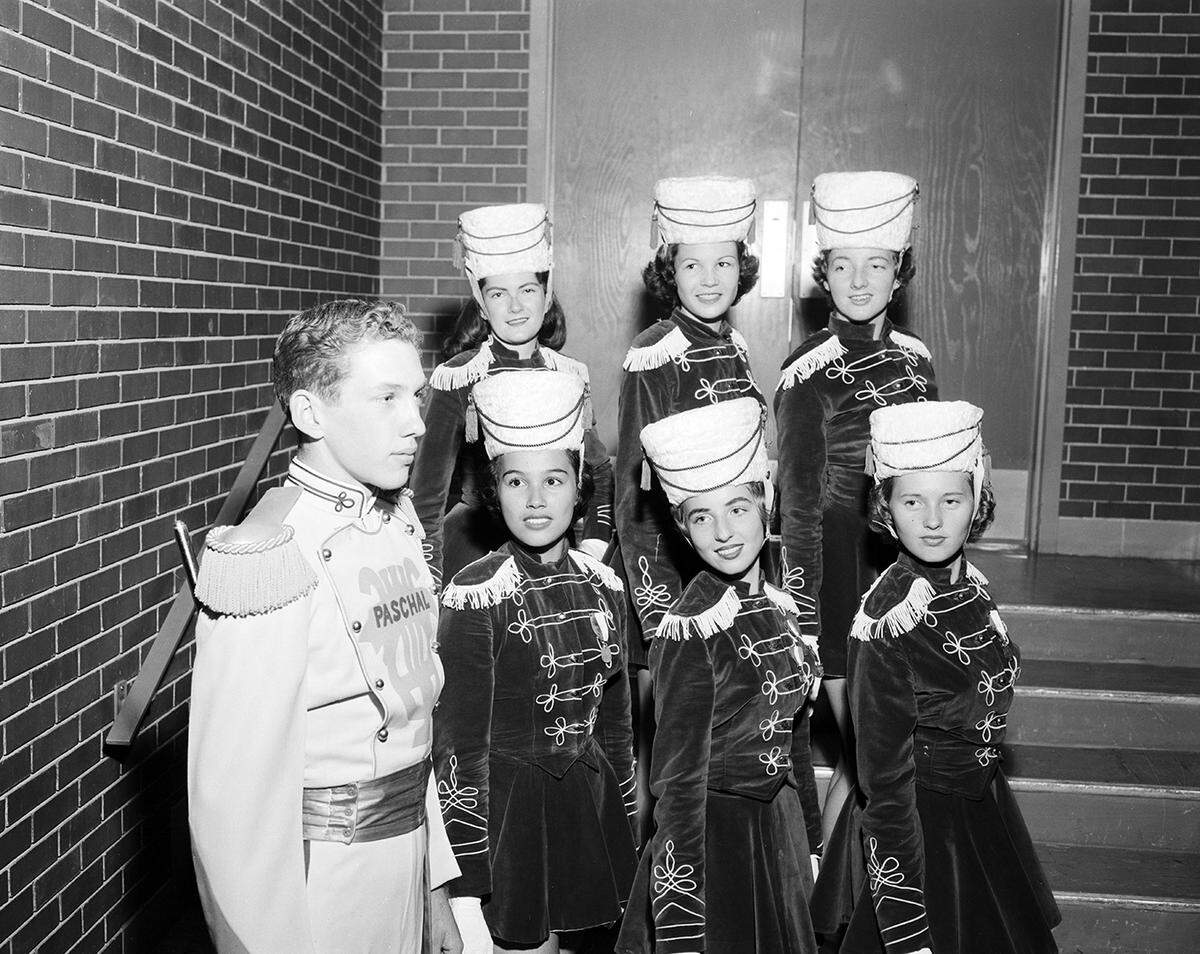 Nov. 14, 1958: Paschal High School’s troupe of majorettes led by Drum Maj. Gene McCreary includes, from left front: Dolores Saldana, Glynnene LePhiew, Annette Dean, Jann Youngblood, Pamella Locke and Kaye Rogers.