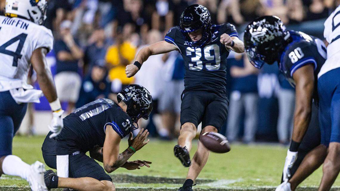TCU kicker Griffin Kell (39) gets his field goal attempt blocked to end the game between the TCU Horned Frogs and the West Virginia Mountaineers at Amon G. Carter Stadium in Fort Worth on Saturday, Sept. 30, 2023. The Horned Frogs lost 24-21.