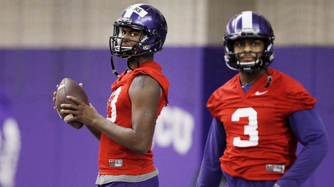 TCU quarterbacks Justin Rogers, left, and Shawn Robinson work out during the Horned Frogs' second spring practice.