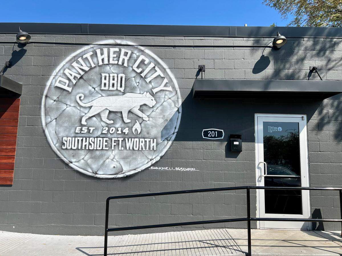 Panther City BBQ moved into a bar space next door to its original patio location.