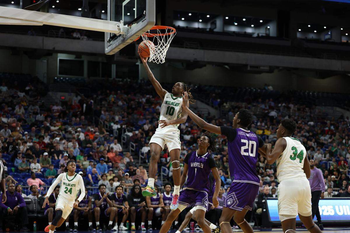 Kennedale junior Trey Smith attacks the basket in an MVP performance in the Class 4A D2 state championship against Wheatley at the Alamodome in San Antonio on Friday, March 7, 2025.
