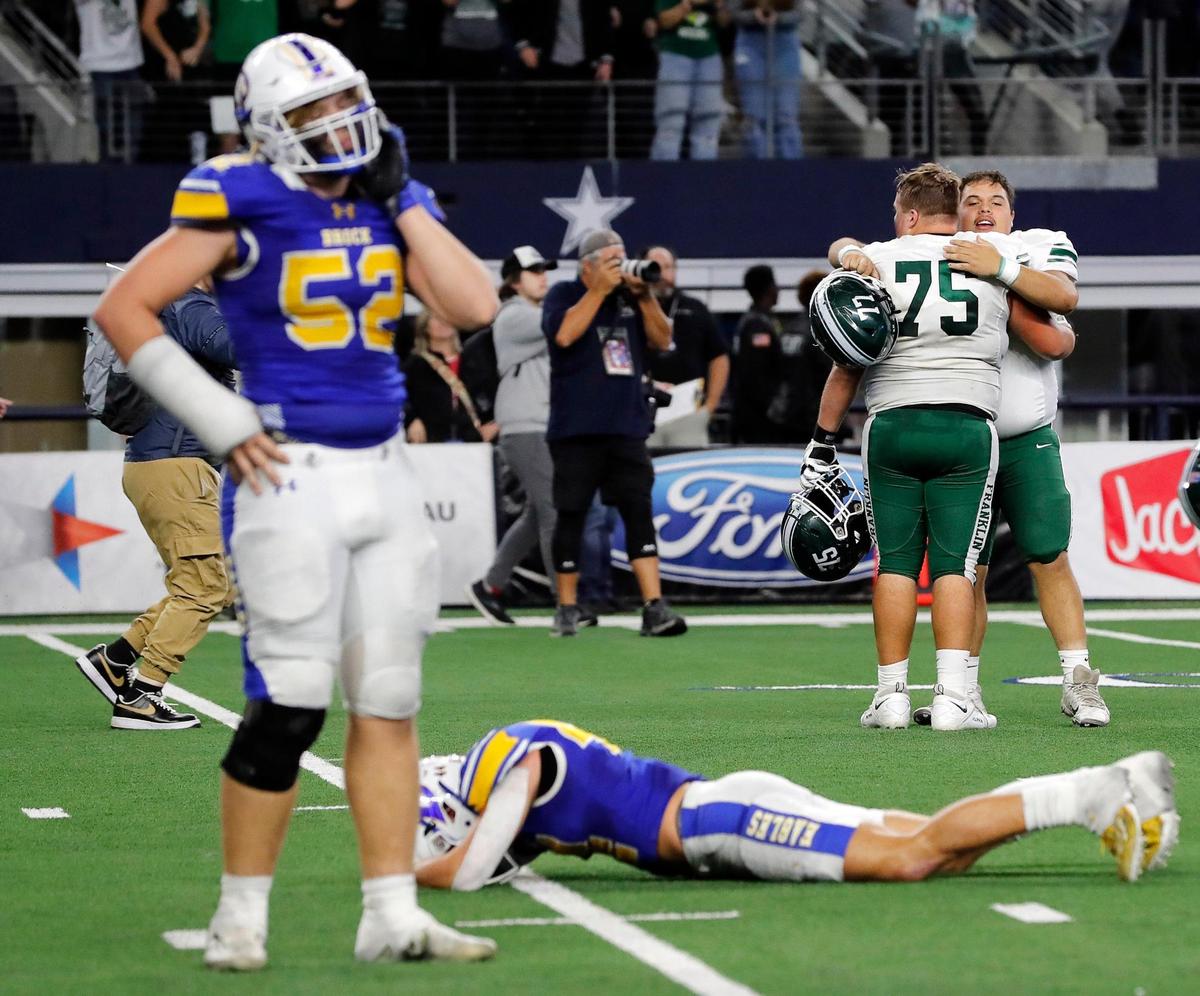 Brock lineman Brock Riker (52) stands by team mate defensive end Cam Harris (44) as Franklin linemen Andrew Elmore (75) and Andrew Narro (77) celebrate in the background after a UIL Class 3A D2 state championship football game at AT&T Stadium in Arlington, Texas, Thursday , Dec. 15, 2022. Franklin defeated Brock 17-14 as the clock ran out. (Star-Telegram Bob Booth)