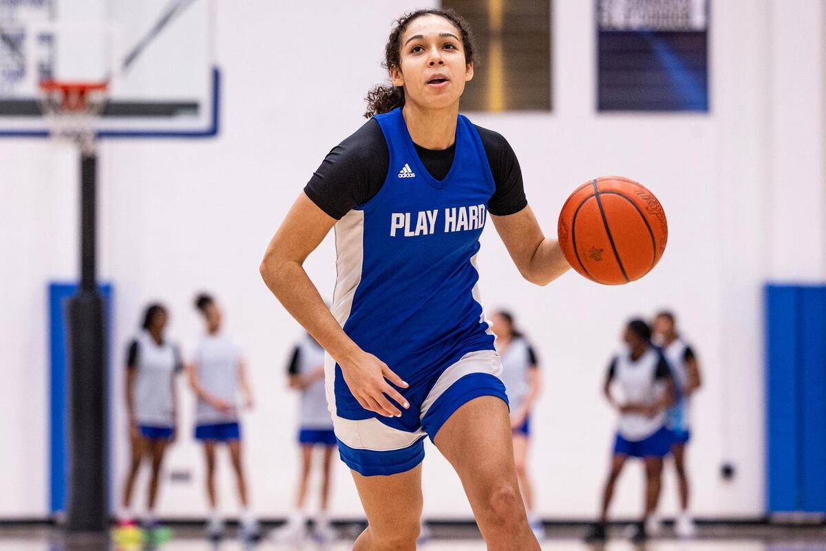 Boswell senior Camille Williams (1) smiles while completing a drill during a scrimmage in practice at the Boswell High School gymnasium in Fort Worth on Wednesday, Jan. 29, 2025.