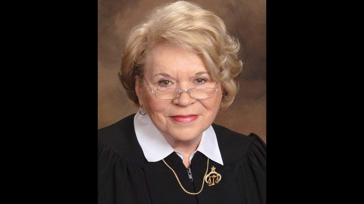 Justice of the Peace Jacquelyn Wright, indicted this week on felony charges of theft of services and tampering with a government record, calls the charges “a twisted political vendetta.”