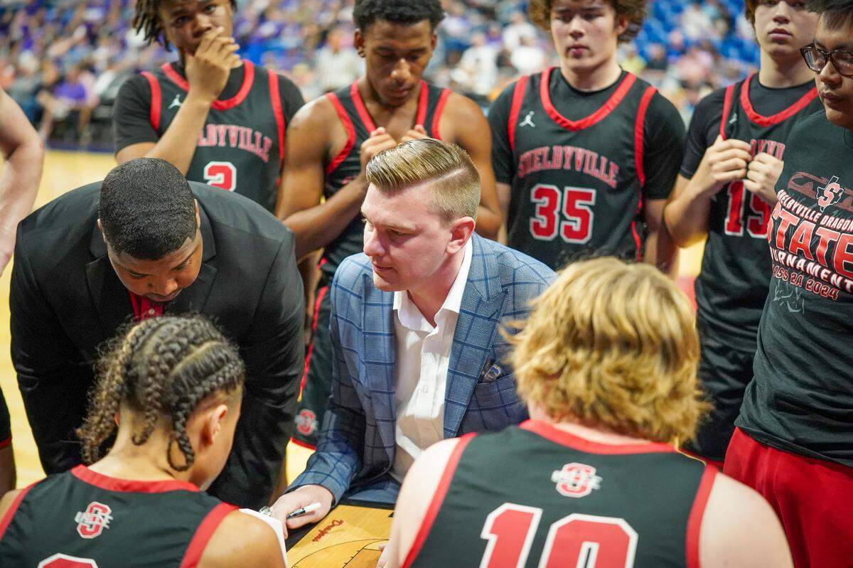 Shelbyville head coach Colton Wager draws up a play during a time out against Thrall in a Class 2A state semifinal on Friday, March 8, 2024 at the Alamodome in San Antonio, Texas. Shelbyville defeated Thrall 67-52.