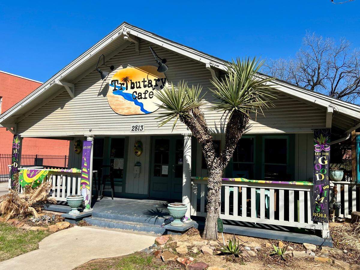 Tributary Cafe with Mardi Gras signs on Feb. 15, 2023.
