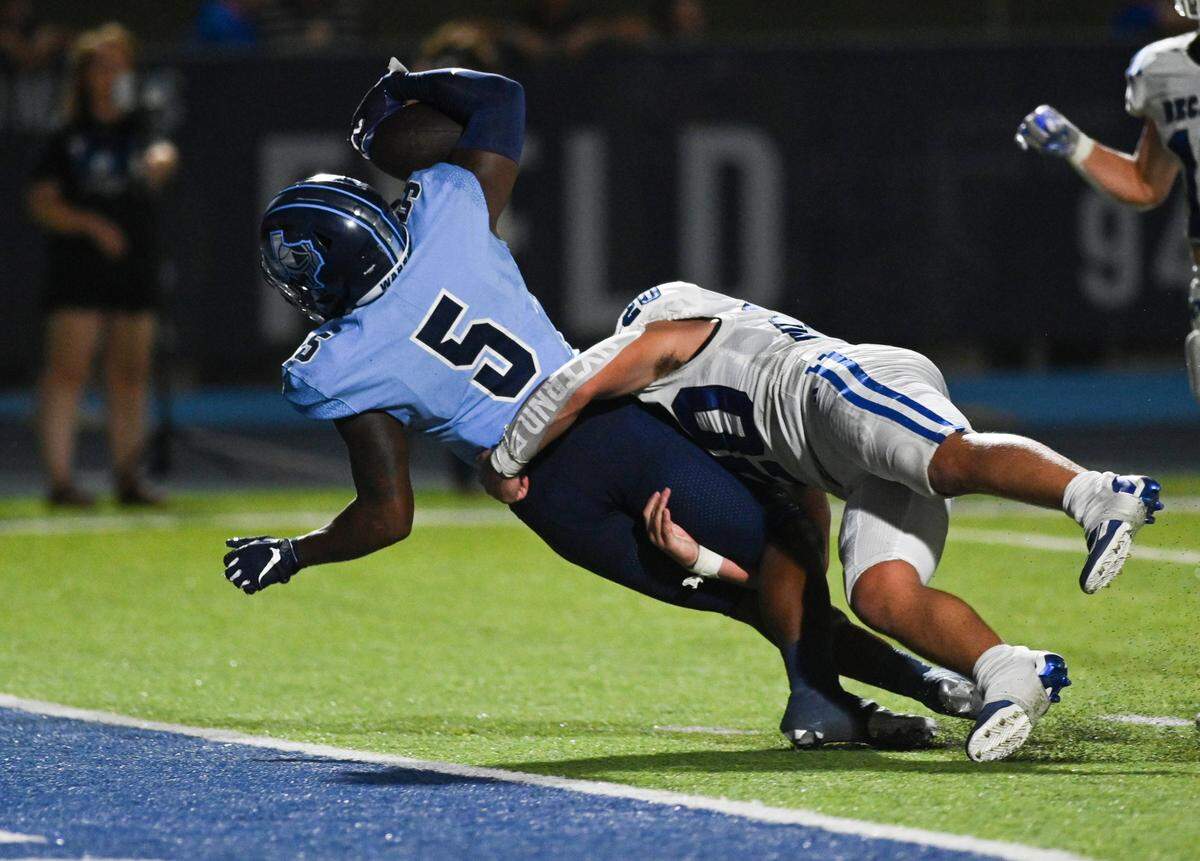 Liberty Christian running back Chase Garnett, #5, dives for a touchdown during a UIL football game against Decatur at Warrior Stadium in Argyle, Texas on Friday, Sept. 13, 2024.