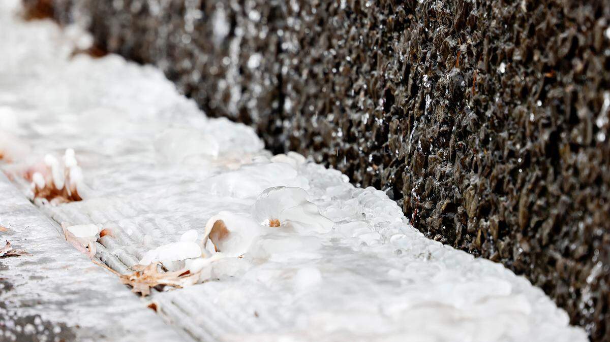 Water from a fountain outside of AT&T Stadium is frozen during Winter Weather Advisory on Sunday, January 14, 2024, in Arlington.