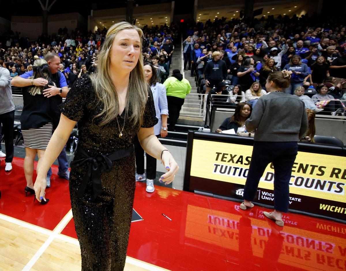 Byron Nelson head coach Brianne Groth holds back tears as she enters the court after winning the UIL 6A D2 State Final volleyball match at Curtis Culwell Center in Garland Texas, Saturday, Nov. 23, 2024.