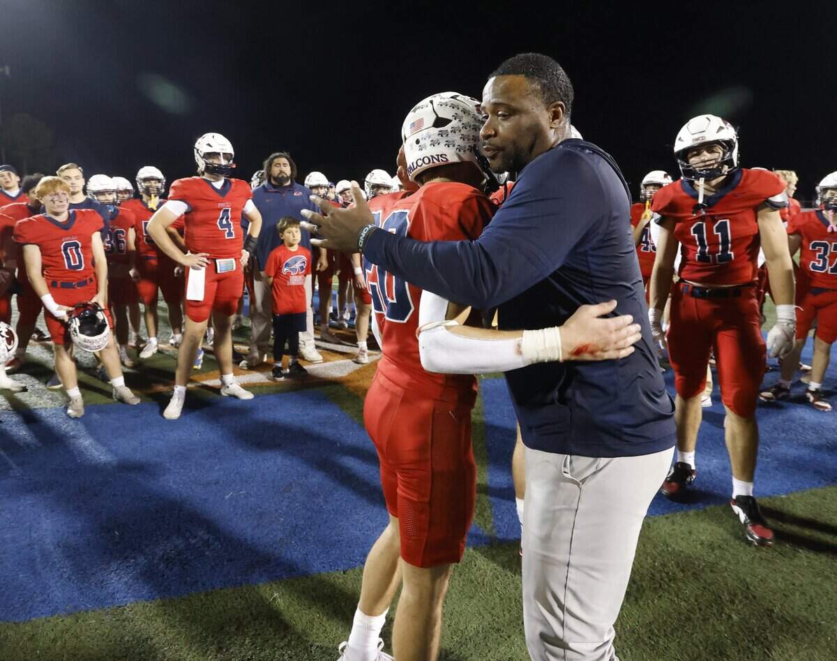 Oakridge head coach Jeromy Flowers talked to and hugged all of the Fort Worth Country Day schools captains after the SPC 2025 3A Football Championship football game between The Oakridge School and Fort Worth Country Day at Mavericks Stadium in Arlington, Texas, Saturday Nov. 08, 2025.