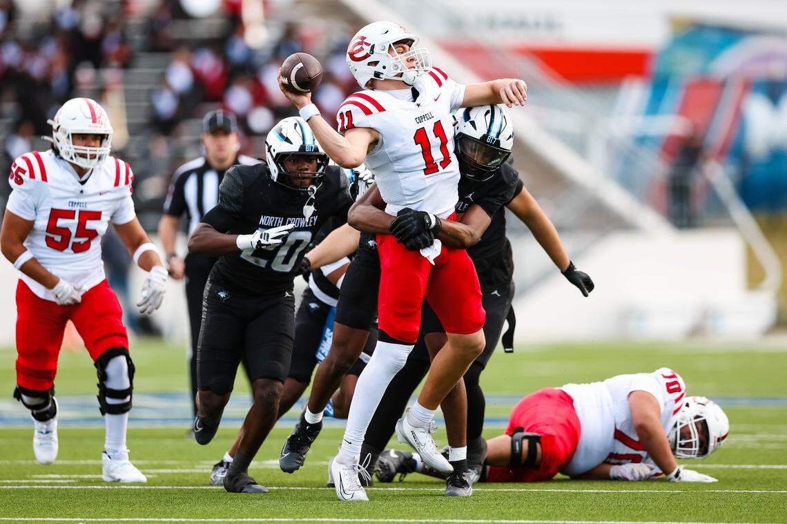 North Crowley defenders swarm and tackle Coppell quarterback Carter Zingelmann in a Class 6A Division I regional playoff Saturday, Nov. 29, 2025, at Midlothian ISD Stadium in Midlothian.