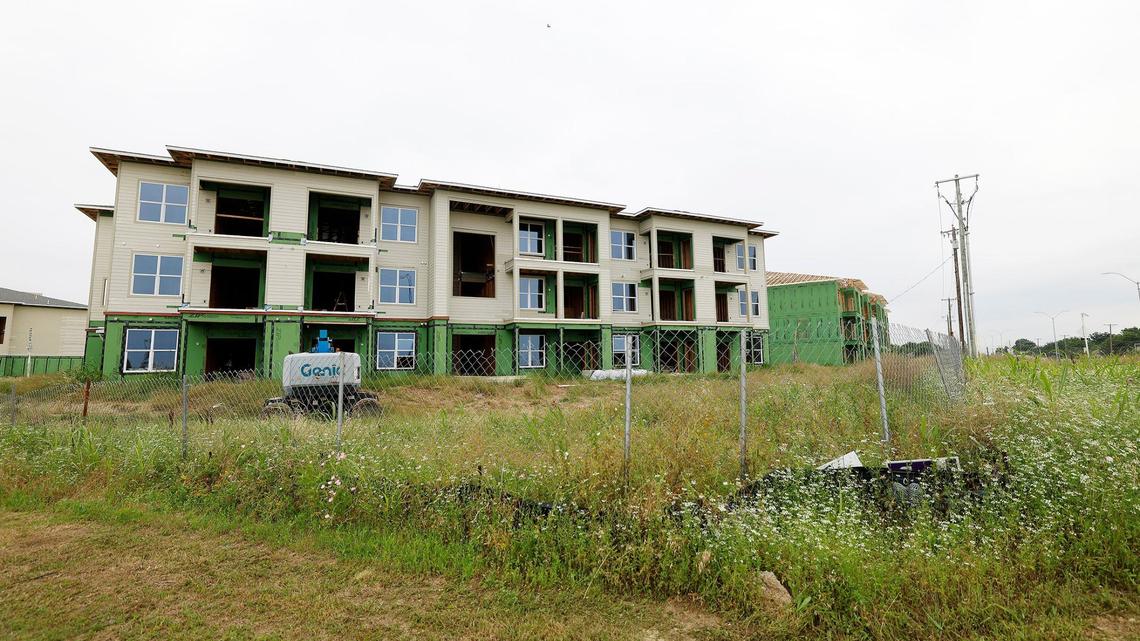 An apartment complex under construction on North Riverside Drive in Fort Worth in May. New apartment construction in Cowtown jumped in the late 2010s, before plunging in recent years.