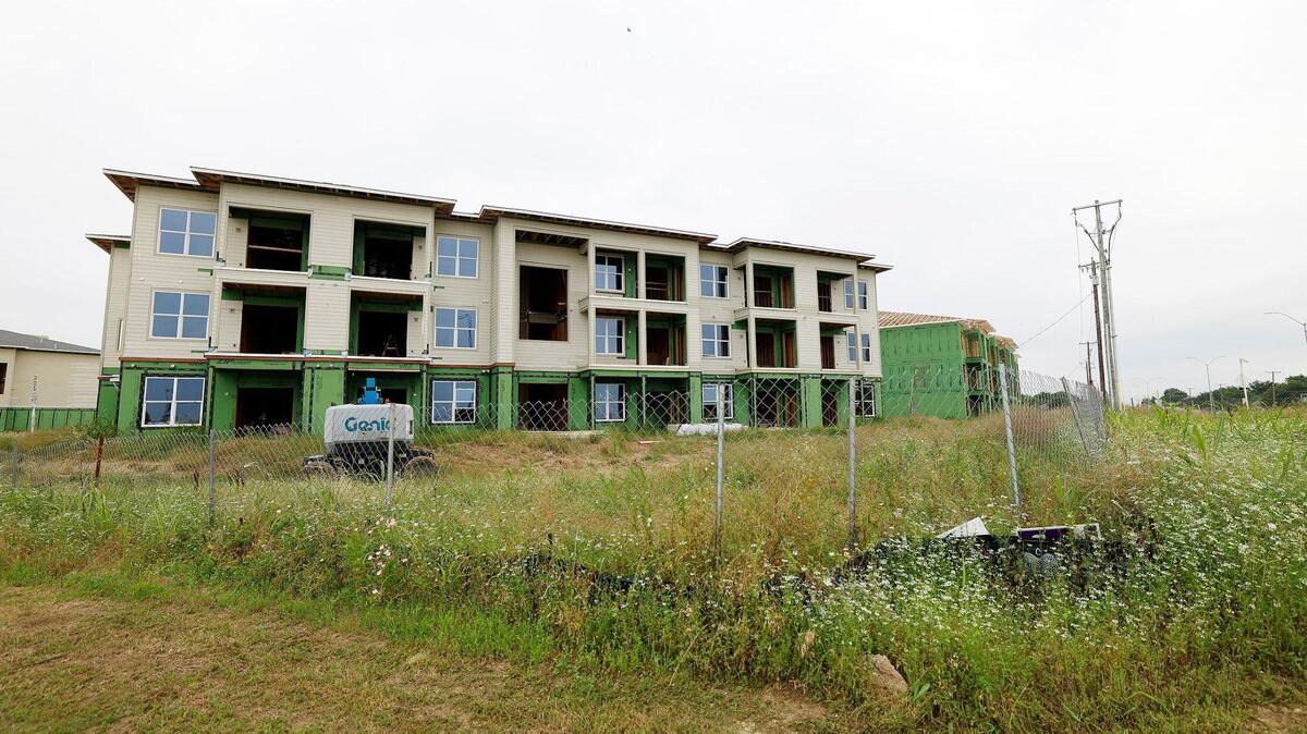 An apartment complex under construction on North Riverside Drive in Fort Worth in May. New apartment construction in Cowtown jumped in the late 2010s, before plunging in recent years.