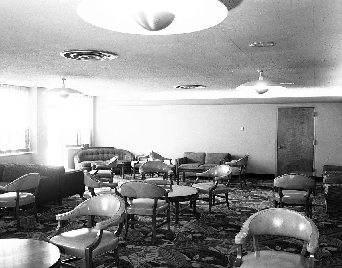 April 16, 1953: Interior shot of a room with many chairs and couches at the Greater Fort Worth International Airport. The carpet has an intricate floral pattern. The airport is also known as the Greater Southwest International Airport and Amon Carter Field.
