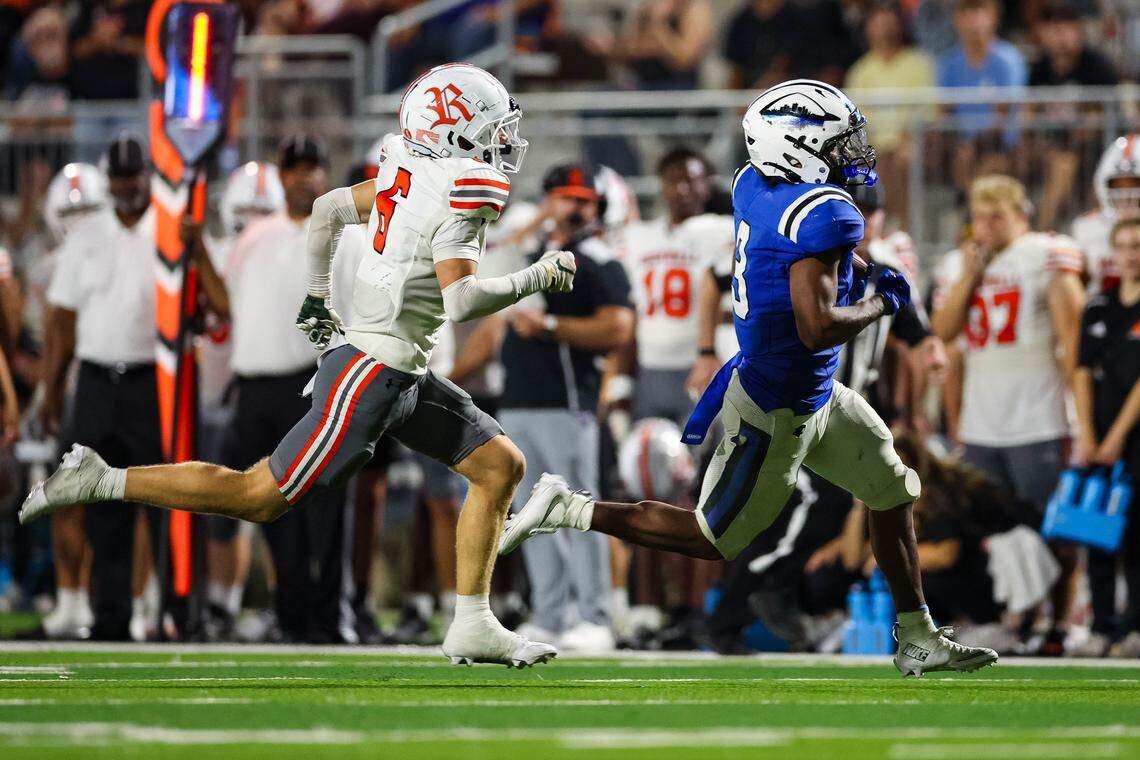 North Crowley running back G'Yrell Smith runs past a Rockwall defender that would result in a touchdown in a non-district game between North Crowley and Rockwall at Crowley ISD Stadium in Crowley, Texas on Sept. 18, 2025.