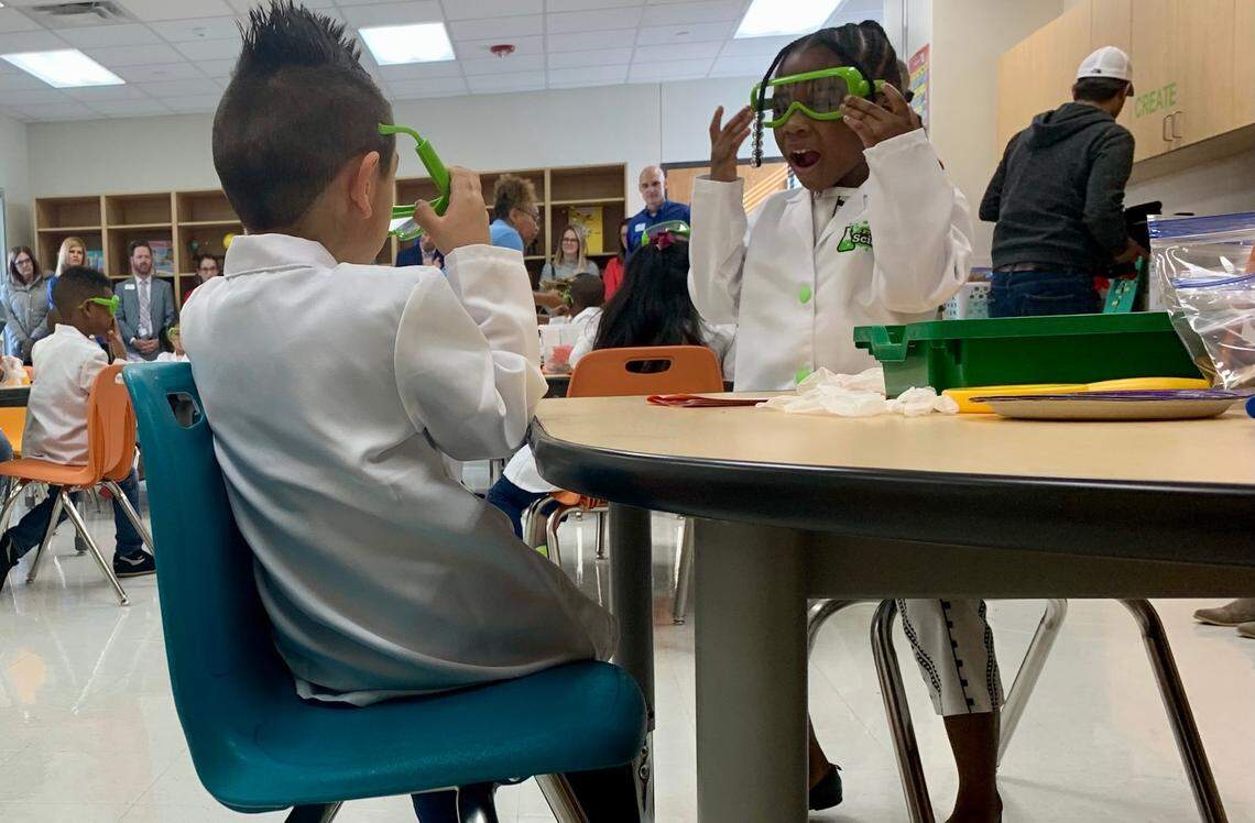 Pre-K students A’Nyia Stafford and Ian Casares prepare for a STEM experiment on Friday, March 24. Arlington ISD announced the expansion of pre-K to all 4-year-olds who want it for the first time, with registration opening April 1. 