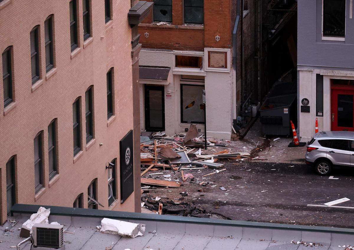 Debris can be seen along West 8th Street beside the Sandman Signature Hotel in downtown Fort Worth where a powerful explosion occurred on Monday, January 8, 2024. At least 21 were injured in the explosion.