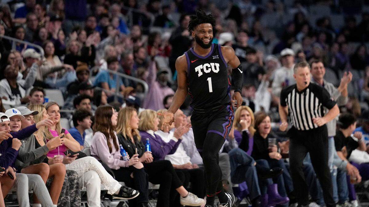 TCU guard Mike Miles Jr. (1) celebrates after sinking a 3-point shot in the second half of the team’s NCAA college basketball game against SMU in December.