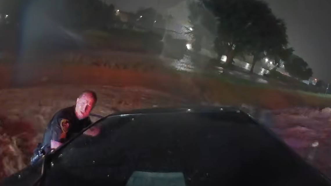 White Settlement officers rescued a mother and three children from floodwaters on Western Hills Boulevard after heavy North Texas storms, police said.