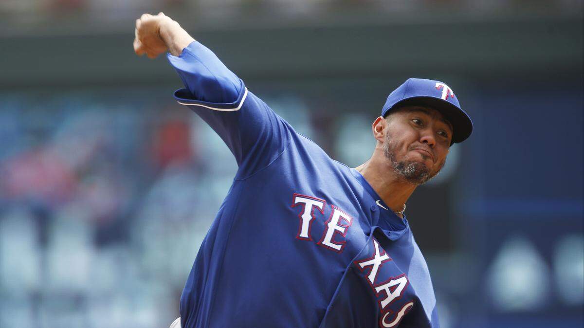 Yovani Gallardo allowed a pair of two-run homers over 5 1/3 innings Saturday in the second start of his second stint with the Rangers.
