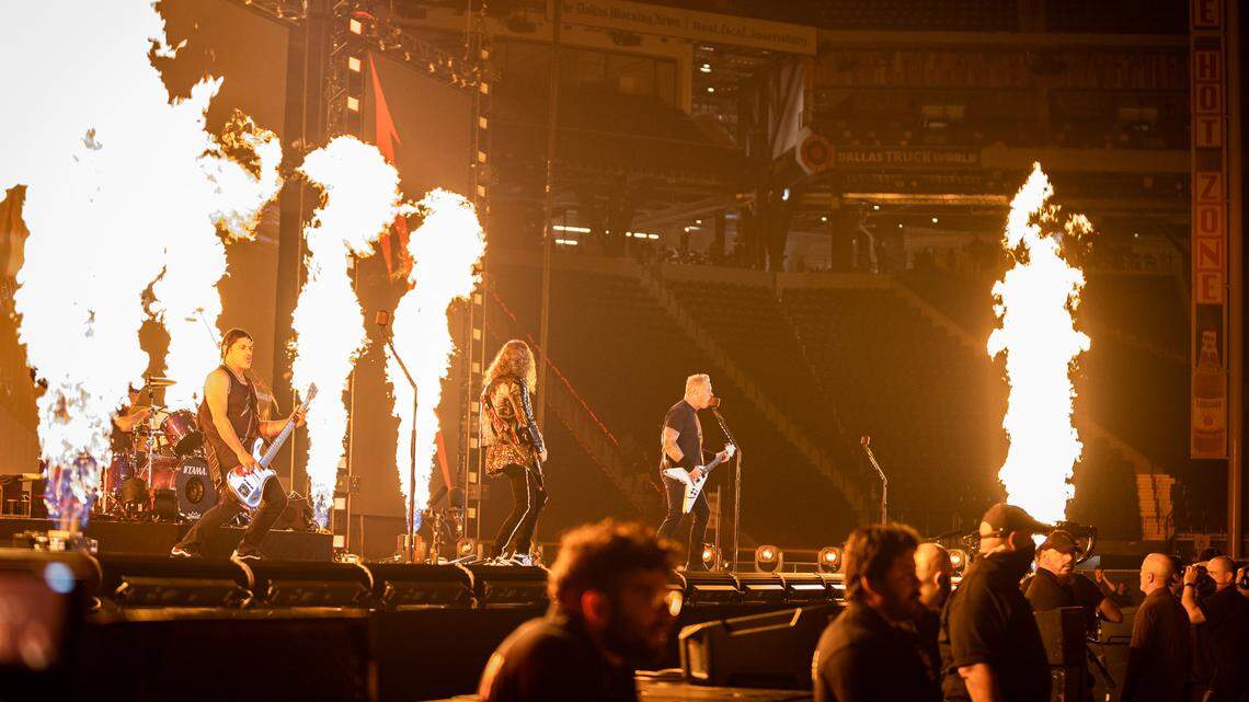 Rock band Metallica played a couple of songs before a string of Triad Combat fights Saturday night at Globe Life Field in Arlington. The band played more songs in between fights.