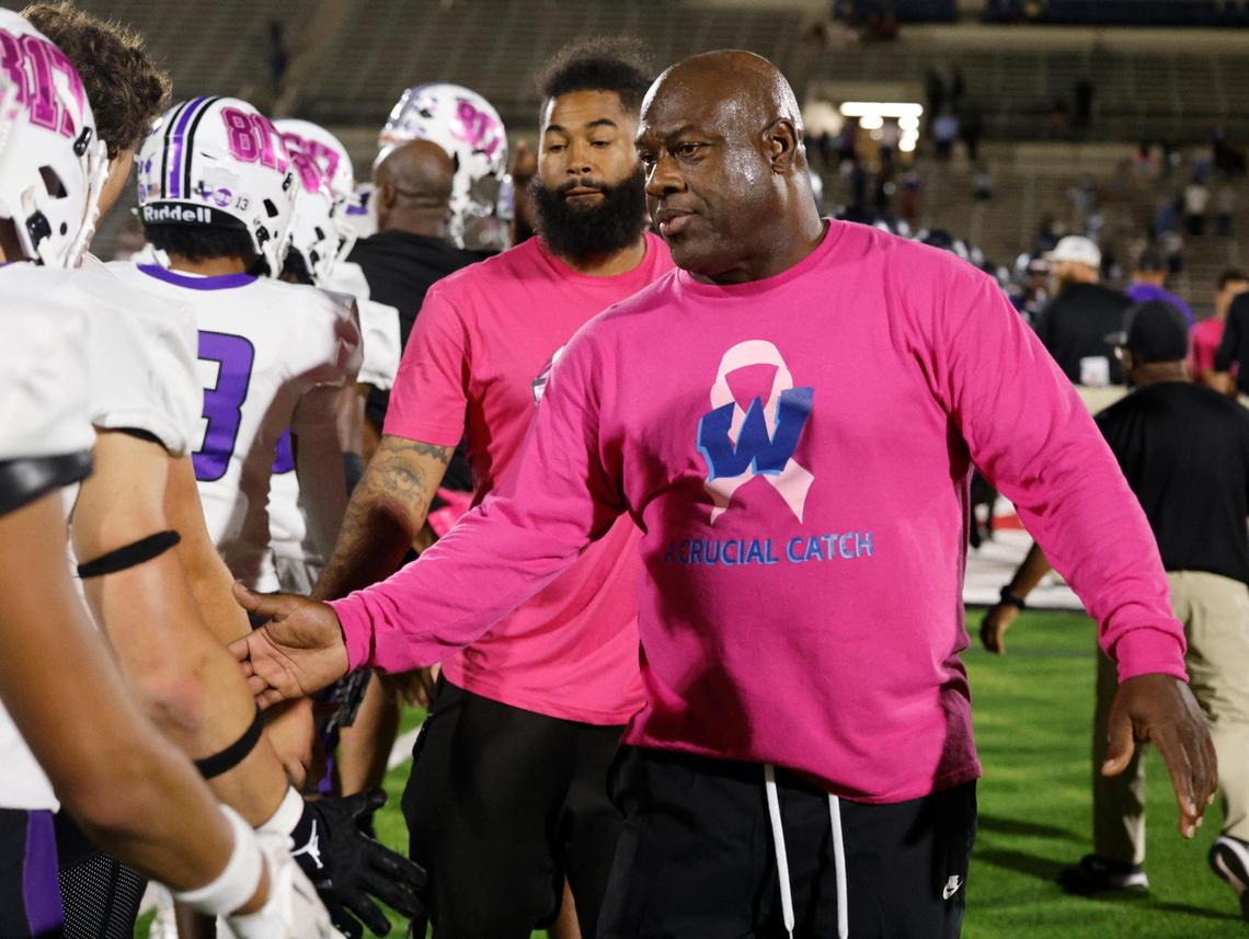 Wyatt head coach Zachary Criss congratulates Paschal players after a District 4-5A Division 1 football game at Herman Clark Stadium in Fort Worth, Texas, Thursday, Oct. 24, 2024.