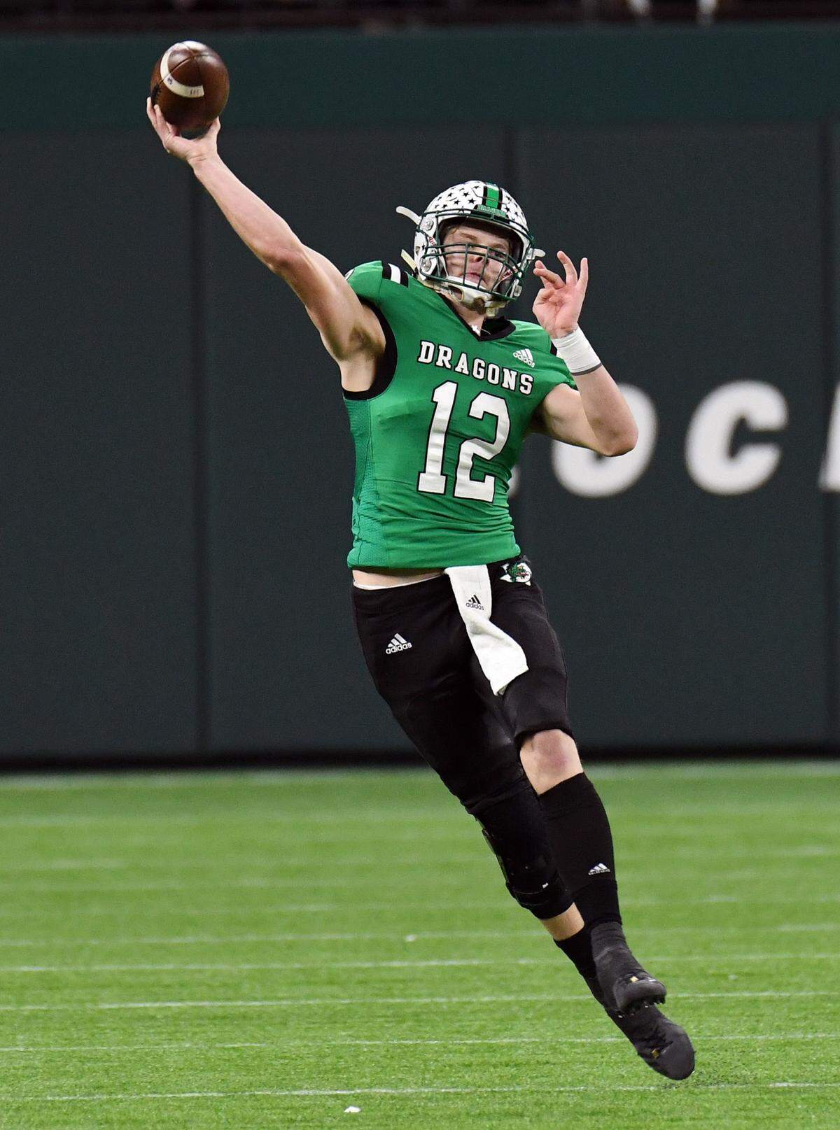Southlake Carroll quarterback Kaden Anderson throws to Jacob Jordan for a touchdown to take a 13-0 lead over Midland Legacy the first quarter of their Class 6A Division 1 Area football game Saturday, November 20, 2021 at Globe Life Field in Arlington, Texas. Special/Bob Haynes