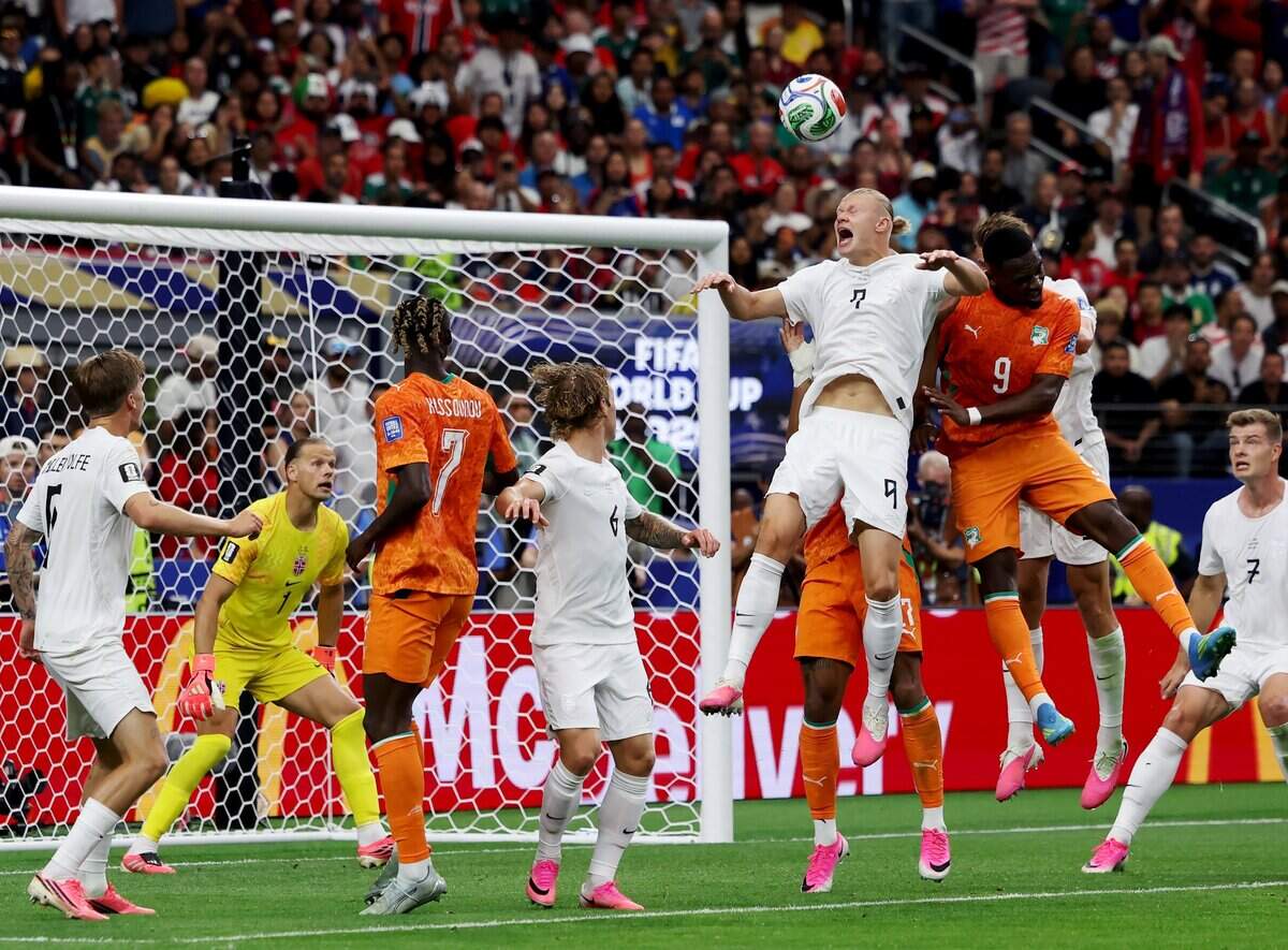 Norway striker Erling Haaland (9) heads the ball away from the goal during a corner kick by Ivory Coast during the 2026 FIFA World Cup knockout match between Norway and Ivory Coast on Tuesday, June 30, 2026, at Dallas Stadium in Arlington.