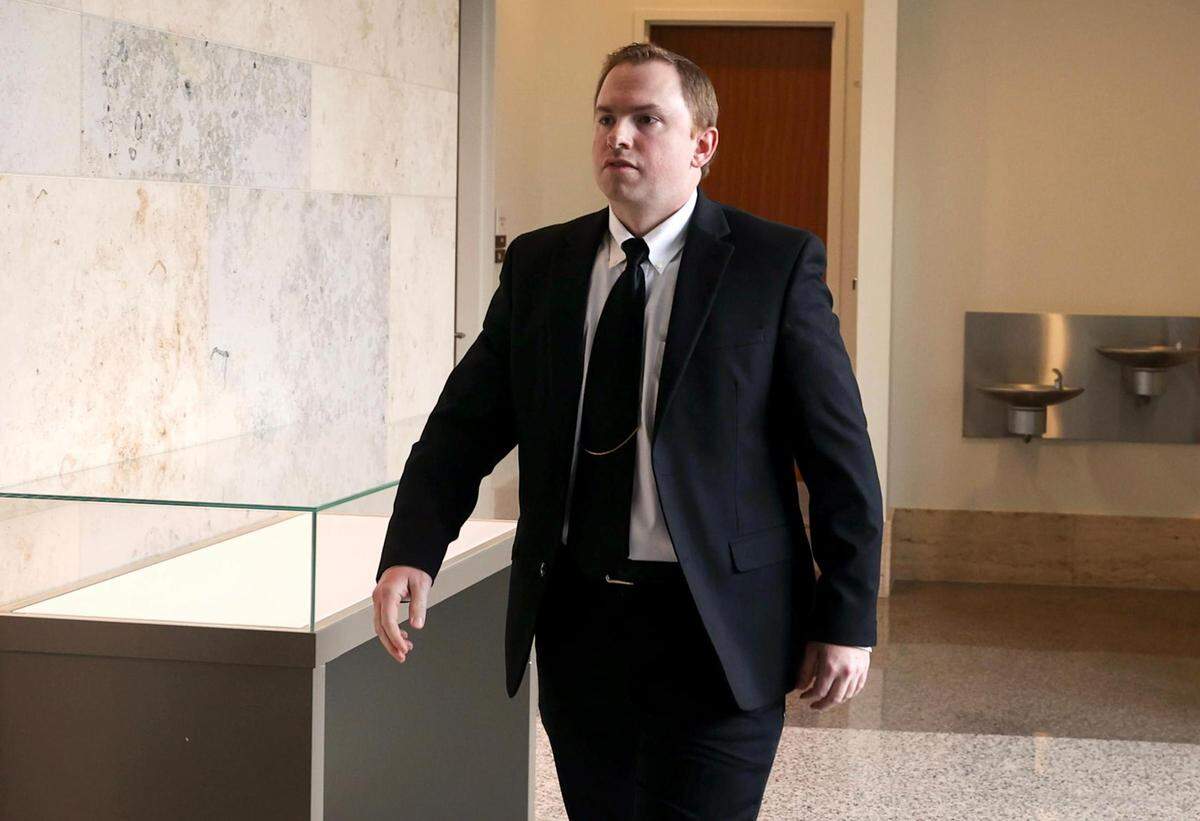 Aaron Dean, who is charged with the murder of Atatiana Jefferson, walks into the courtroom following a break in the third day of a pre-trial hearing on Wednesday, May 4, 2022, in Fort Worth. Dean’s lawyers requested a delay in the trial and for it to be moved out of Tarrant County.