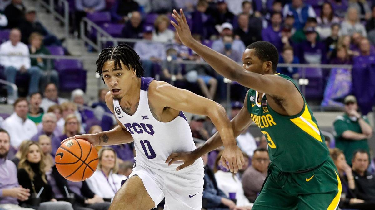TCU guard Micah Peavy (0) drives the ball on Baylor guard Dale Bonner (3) during the second half on Jan. 8 in Fort Worth. Peavy is a dominant defender but would like to become more consistent on offense.